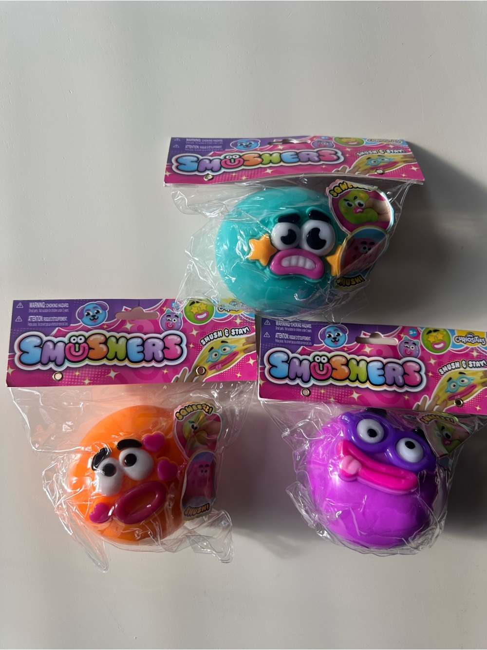 Viral Orb Curiosities Smushers - Set of 3 Orange, purple and teal